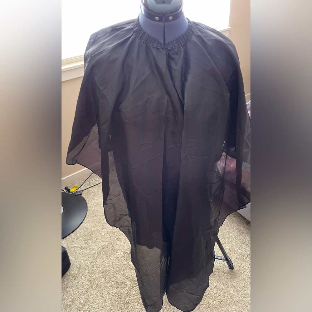Black Hairdresser Cape And Equipment